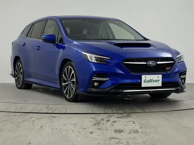 スバル レヴォーグ 1．8STIスポーツ EX 熊本県 2022(令4)年 2.7万km WRブルーパール ＳＴｉエアロフル　/ＳＴｉマフラー　/純正11.6インチナビ（ＢＴ・フルセグＡＵＸ・ｉｐｏｄ・ＵＳＢ）/バックカメラ　/純正前方ドライブレコーダー　/ビルトインＥＴＣ　/後ろのみクリアランスソナー　/アイサイト/・プリクラッシュセーフティ/・ツーリングアシスト/・緊急時プリクラッシュステアリング/・前側方プリクラッシュブレーキ/・後側方警戒支援機能/・ハイビームアシスト/・誤発進制御機能/・アダブティブクルーズコントロール/・車線逸脱抑制機能/・ふらつき警報機能/・先行車発進お知らせ機能/・ブラインドスポットモニター/横滑り防止/デジタルインナーミラー/全席シートヒーター/前席パワーシート/パワーバックドア/パドルシフト/バーチャルコックピット/社外フロアマット/純正１８インチＡＷ/オートライト/LEDヘッドライト/フォグランプ/スマートキー/プッシュスタート