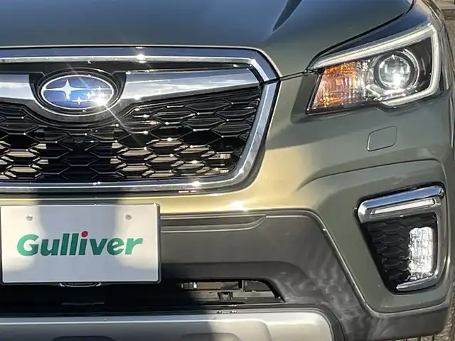 スバル フォレスター ハイブリッド アドバンス 宮城県 2019(令1)年 4.5万km ジャスパーグリーンM DIATONEサウンドナビ/(ラジオ、CD、SD、USB、BT)/サンルーフ/(スライド/チルト)/ルーフレール/追従クルーズコントロール/オートビークルホールド/純正アルミホイール/レザーシート/サイドカメラ/デジタルインナーミラー/電動パーキングブレーキ/純正アルミホイールスタッドレスタイヤ/(225/55R18)/純正ETC2.0/純正フロアカーペット/純正フロントグリル/純正ドアバイザー/純正LEDアクセライナー/純正リアビューカメラ/スペアキー×１/社外ドライブレコーダー前方/パワーリアゲート/パワーリアゲート開閉高さメモリー機能/SRH　on/off切り替えスイッチ/アイサイト警報on/offスイッチ/VDCon/offスイッチ/レーンキープアシスト/ステアリングヒーター/オートライト/Xモード/D、N席パワーシート/全席シートヒーター/プリクラッシュセーフティー