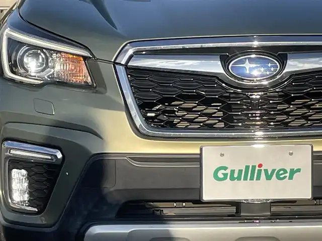 スバル フォレスター ハイブリッド アドバンス 宮城県 2019(令1)年 4.5万km ジャスパーグリーンM DIATONEサウンドナビ/(ラジオ、CD、SD、USB、BT)/サンルーフ/(スライド/チルト)/ルーフレール/追従クルーズコントロール/オートビークルホールド/純正アルミホイール/レザーシート/サイドカメラ/デジタルインナーミラー/電動パーキングブレーキ/純正アルミホイールスタッドレスタイヤ/(225/55R18)/純正ETC2.0/純正フロアカーペット/純正フロントグリル/純正ドアバイザー/純正LEDアクセライナー/純正リアビューカメラ/スペアキー×１/社外ドライブレコーダー前方/パワーリアゲート/パワーリアゲート開閉高さメモリー機能/SRH　on/off切り替えスイッチ/アイサイト警報on/offスイッチ/VDCon/offスイッチ/レーンキープアシスト/ステアリングヒーター/オートライト/Xモード/D、N席パワーシート/全席シートヒーター/プリクラッシュセーフティー