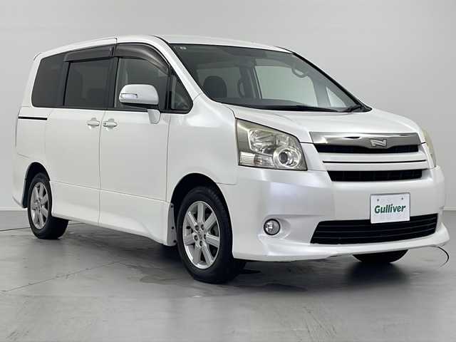 トヨタ ノア Si 岐阜県 2009(平21)年 12.1万km ホワイトパールクリスタルシャイン ワンオーナー/社外スマホ連動ディスプレイオーディオ/地デジチューナー/両側パワースライドドア/HIDヘッドライト/スマートキー/ETC/保証書/取扱説明書