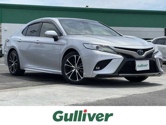 トヨタ カムリ WSレザーパッケージ 徳島県 2019(平31)年 1.2万km シルバーM 純正ナビ/(CD・DVD/Bluetooth/TV)/バックカメラ/ステアリングスイッチ/純正ビルトインETC/純正前方ドライブレコーダー/衝突被害軽減ブレーキ/追従機能付クルーズコントロール/レーンキープアシスト/ブラインドスポットモニター/リヤクロストラフィックアラート/ヘッドアップディスプレイ/サンルーフ/革調シート/パワーシート/シートヒーター/LEDヘッドライト/オートマチックハイビーム/オートライト/フロントフォグライト/電動パーキングブレーキ/ブレーキホールド/純正18インチアルミホイール/サイドバイザー/スマートキー/純正フロアマット