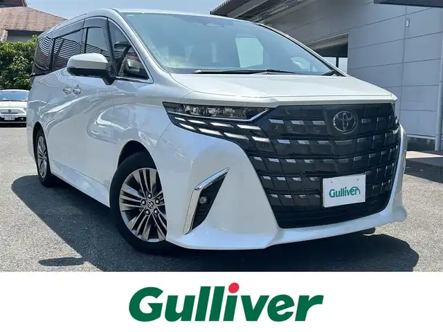 トヨタ アルファード Z 奈良県 2024(令6)年 0.7万km プラチナホワイトパールマイカ ワンオーナー/純正メーカナビ/ムーンルーフ/サイドエンブレム/置き充電/ベンチレーション/シートヒーター/サンシェード/デジタルインナーミラー/黒レザーシート/パワーシート/スペアキー/クルコン追従/メモリーシート/パワーバック/アラウンドビューカメラ/取扱説明書/保証書