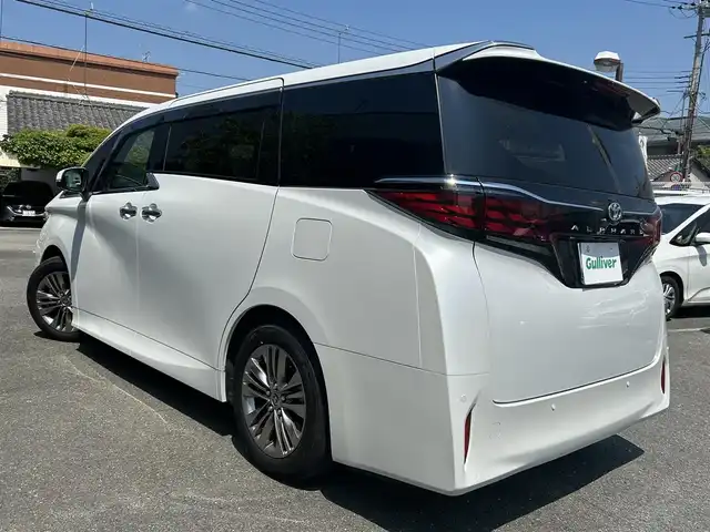 トヨタ アルファード Z 奈良県 2024(令6)年 0.7万km プラチナホワイトパールマイカ ワンオーナー/純正メーカナビ/ムーンルーフ/サイドエンブレム/置き充電/ベンチレーション/シートヒーター/サンシェード/デジタルインナーミラー/黒レザーシート/パワーシート/スペアキー/クルコン追従/メモリーシート/パワーバック/アラウンドビューカメラ/取扱説明書/保証書