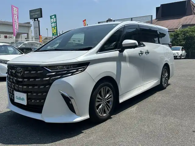 トヨタ アルファード Z 奈良県 2024(令6)年 0.7万km プラチナホワイトパールマイカ ワンオーナー/純正メーカナビ/ムーンルーフ/サイドエンブレム/置き充電/ベンチレーション/シートヒーター/サンシェード/デジタルインナーミラー/黒レザーシート/パワーシート/スペアキー/クルコン追従/メモリーシート/パワーバック/アラウンドビューカメラ/取扱説明書/保証書
