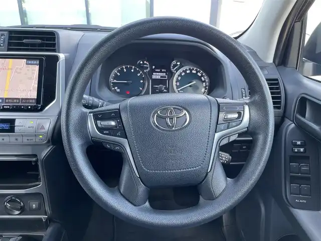 トヨタ ランドクルーザー プラド TX 香川県 2021(令3)年 3.9万km ブラック 登録時走行距離：38527km/アルパイン9型ナビ/　CD DVD BT フルセグTV/バックカメラ/サンルーフ/ルーフレール/プリクラッシュセーフティシステム/レーンデパーチャーアラート/レーダークルーズコントロール/クリアランスソナー/オートハイビーム/LEDヘッドライト/オートライト/フォグランプ/ヘッドライトウォッシャー/MTモード付AT/革調シートカバー/プッシュスタート/スマートキー