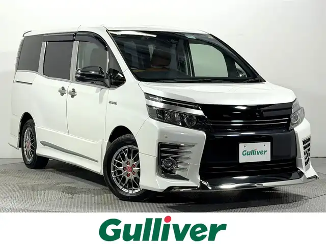 トヨタ ヴォクシー ハイブリッド ZS 煌Ⅱ 大阪府 2016(平28)年 4.2万km ホワイトパールクリスタルシャイン モデリスタエアロ 10incナビTV バックカメラ 衝突軽減ブレーキ レーンアシスト オートハイビーム スマートキー プッシュスタート 両側パワースライドドア クリアランスソナー ドライブレコーダー ETC