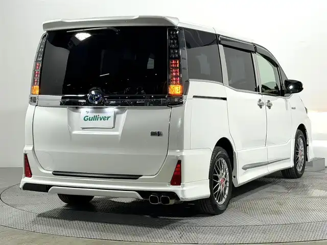トヨタ ヴォクシー ハイブリッド ZS 煌Ⅱ 大阪府 2016(平28)年 4.2万km ホワイトパールクリスタルシャイン モデリスタエアロ 10incナビTV バックカメラ 衝突軽減ブレーキ レーンアシスト オートハイビーム スマートキー プッシュスタート 両側パワースライドドア クリアランスソナー ドライブレコーダー ETC