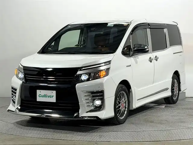 トヨタ ヴォクシー ハイブリッド ZS 煌Ⅱ 大阪府 2016(平28)年 4.2万km ホワイトパールクリスタルシャイン モデリスタエアロ 10incナビTV バックカメラ 衝突軽減ブレーキ レーンアシスト オートハイビーム スマートキー プッシュスタート 両側パワースライドドア クリアランスソナー ドライブレコーダー ETC