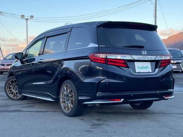 ホンダ オデッセイ アブソルート・Xホンダセンジング 山梨県 2016(平28)年 4.4万km プレミアムヴィーナスブラックP 純正ナビ/両側パワースライドドア/クルーズコントロール/ドライブレコーダー/運転席パワーシート/ハーフレザー/前後コーナーセンサー/ホンダセンシング/ステアリングリモコン/社外アルミホイール