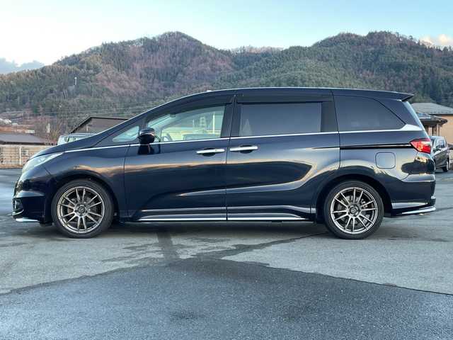 ホンダ オデッセイ アブソルート・Xホンダセンジング 山梨県 2016(平28)年 4.4万km プレミアムヴィーナスブラックP 純正ナビ/両側パワースライドドア/クルーズコントロール/ドライブレコーダー/運転席パワーシート/ハーフレザー/前後コーナーセンサー/ホンダセンシング/ステアリングリモコン/社外アルミホイール