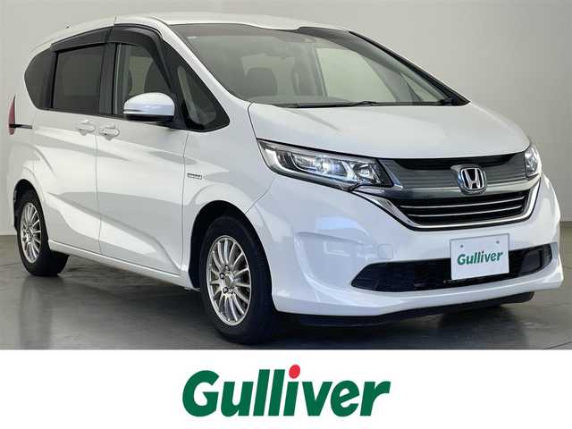 ホンダ フリード ハイブリット G ホンダセンシング 愛知県 2019(平31)年 5.6万km ホワイトオーキッドパール 社外ナビ　フルセグＴＶ　Ｂｌｕｅｔｏｏｔｈ　バックカメラ　両側パワースライドドア　前後ドライブレコーダー　オートライト　ＬＥＤヘッドライト　ホンダセンシング　衝突軽減　追従クルコン　車線逸脱　禁煙車
