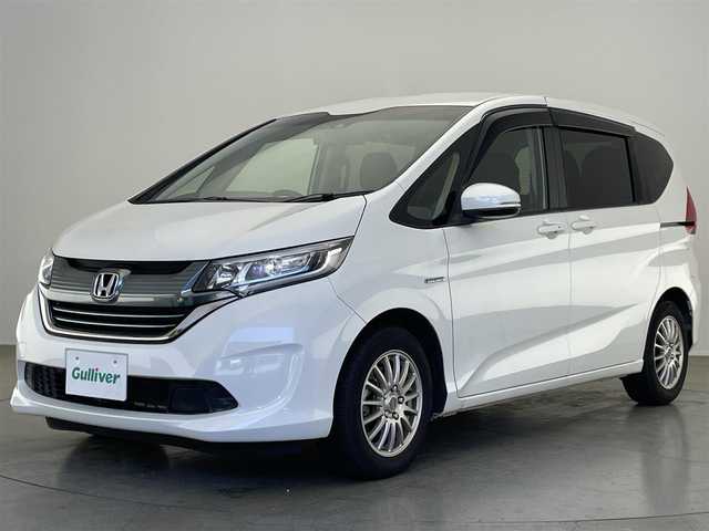 ホンダ フリード ハイブリット G ホンダセンシング 愛知県 2019(平31)年 5.6万km ホワイトオーキッドパール 社外ナビ　フルセグＴＶ　Ｂｌｕｅｔｏｏｔｈ　バックカメラ　両側パワースライドドア　前後ドライブレコーダー　オートライト　ＬＥＤヘッドライト　ホンダセンシング　衝突軽減　追従クルコン　車線逸脱　禁煙車