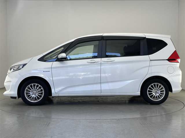 ホンダ フリード ハイブリット G ホンダセンシング 愛知県 2019(平31)年 5.6万km ホワイトオーキッドパール 社外ナビ　フルセグＴＶ　Ｂｌｕｅｔｏｏｔｈ　バックカメラ　両側パワースライドドア　前後ドライブレコーダー　オートライト　ＬＥＤヘッドライト　ホンダセンシング　衝突軽減　追従クルコン　車線逸脱　禁煙車