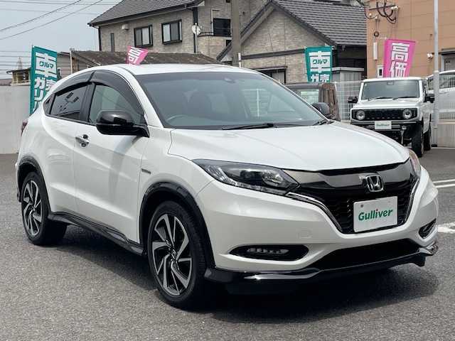 ホンダ ヴェゼル ハイブリッド RS ホンダセンシング 大分県 2017(平29)年 6.7万km ホワイトオーキッドパール 純正メモリーナビ/CD/DVD/BT/USB/HDMI/フルセグTV/バックカメラ/ハーフレザーシート/前席シートヒーター/ホンダセンシング/レーンキープ/レーダークルーズコントロール/ステアリングスイッチ/パドルシフト/オート電動格納ミラー/ドライブレコーダー/ビルトインETC/保証書/取扱説明書/スペアキー