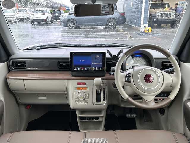 スズキ ラパン ＬＣ X 佐賀県 2024(令6)年 1.4万km トラッドカーキメタリック/アーバンブラウン 2トーン ETC/bluetooth／バックカメラ/スペアキー/プッシュスタート／エアバッグW/オートライト/バックカメラ/ワンオーナー/ABS／レーンキープアシスト／/横滑り防止装置／盗難防止装置/コーナーセンサー/アイドリングストップ/パワーステアリング／パワーウィンドウ/取扱説明書／保証書／点検記録簿/(1ヶ月、6ヶ月、1年）/ハーフレザーシート