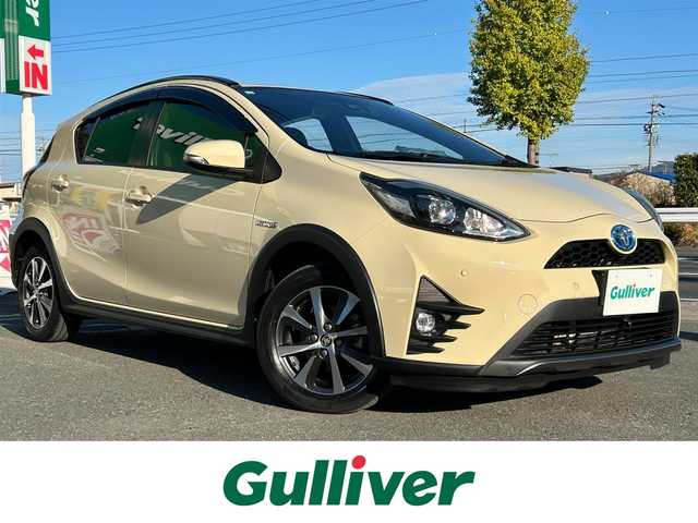 トヨタ アクア クロスオーバー グラム 愛知県 2019(平31)年 7.8万km ベージュ ワンオーナー/純正メモリナビ/フルセグテレビ/バックカメラ/Bluetooth/ウィンカーミラー/クルーズコントロール/ドアバイザー/プッシュスタート/ETC/衝突軽減ブレーキ/レーンキープ/ハーフレザーシート