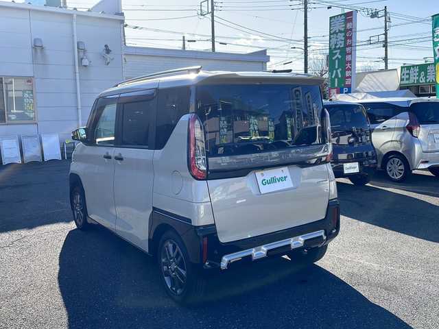 三菱 デリカミニ G プレミアム 東京都 2024(令6)年 0.5万km ナチュラルアイボリーメタリック プッシュスタート/オートパーキング/純正ナビ　/純正フロアマット/シートヒーター/ステアリングヒーター/クルーズコントロール/ステアリングリモコン/ミラーモニター/全方位バックミラー/両側電動スライドドア/電動トランクリッド/フルフラットシート/ルーフレール/説明書/保証書/スペアキー1本