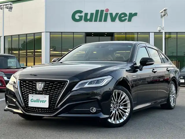 トヨタ クラウン ハイブリッド G 愛媛県 2019(令1)年 4.9万km プレシャスブラックパール 登録時走行距離：48169Km/純正メーカーOPメモリナビ/AM/FM/CD/DVD/TV/BT/SD/ETC2.0/Bカメラ/前後ドラレコ/パワーシート/追従クルコン/横滑り防止装置/盗難防止装置/衝突軽減システム/前後コーナーセンサー/LEDヘッドライト/オートライト/オートハイビーム/エンジンスタートボタン/スマートキー/純正アルミホイール/純正フロアマット