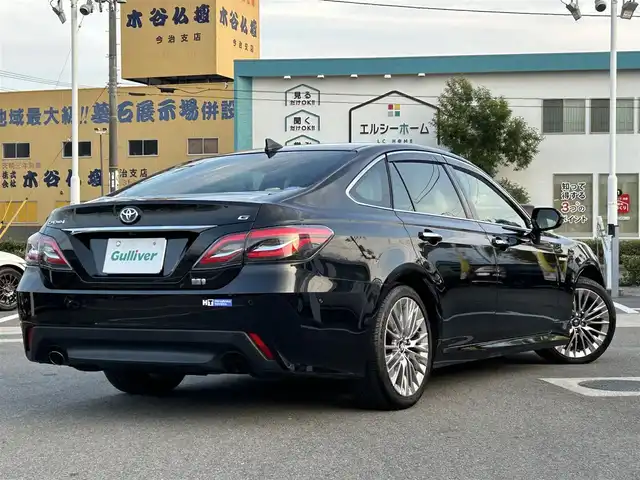 トヨタ クラウン ハイブリッド G 愛媛県 2019(令1)年 4.9万km プレシャスブラックパール 登録時走行距離：48169Km/純正メーカーOPメモリナビ/AM/FM/CD/DVD/TV/BT/SD/ETC2.0/Bカメラ/前後ドラレコ/パワーシート/追従クルコン/横滑り防止装置/盗難防止装置/衝突軽減システム/前後コーナーセンサー/LEDヘッドライト/オートライト/オートハイビーム/エンジンスタートボタン/スマートキー/純正アルミホイール/純正フロアマット