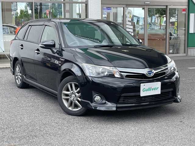 トヨタ カローラ フィールダー HV G エアロツアラー W×B 愛知県 2014(平26)年 13.5万km ブラックマイカ /禁煙車・ワンオーナー車//オーディオレス(AM・FM・CD)//ビルトインETC//ドライブレコーダー【HDR-201G】//HIDオートライト//フロントフォグランプ//15インチ純正アルミホイール//ビークルスタビリティコントロール//横滑り防止//トラクションコントロール//ヒルスタートアシスト//衝突安全ボディ”GOA”//電動格納ミラーウィンカー//黒カーボン調パネル//本革巻ステアリングホイール//ステアリングスイッチ//全窓ワンタッチオープンクローズ機能//モードスイッチ(エコドライブモード・EVドライブモード)//フロントスポーツシート//ファブリック&合皮シート(白色ステッチ)//イルミネーテッドエントリーシステム//オートエアコン(花粉除去モード付)//ナノイー//クリーンエアフィルター(花粉除去タイプ)//アクセサリーソケット(DC12V 120W)//ISOFIX//純正フロアマット(ダブルバイビー仕様)//純正バイザー//スペアキー1本(板キー)//新車保証書・取扱説明書
