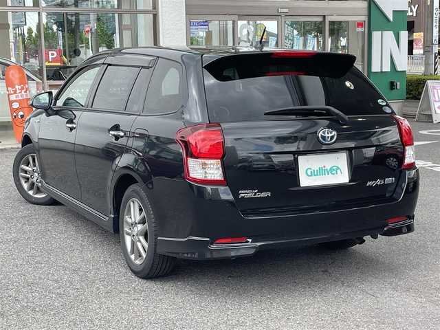 トヨタ カローラ フィールダー HV G エアロツアラー W×B 愛知県 2014(平26)年 13.5万km ブラックマイカ /禁煙車・ワンオーナー車//オーディオレス(AM・FM・CD)//ビルトインETC//ドライブレコーダー【HDR-201G】//HIDオートライト//フロントフォグランプ//15インチ純正アルミホイール//ビークルスタビリティコントロール//横滑り防止//トラクションコントロール//ヒルスタートアシスト//衝突安全ボディ”GOA”//電動格納ミラーウィンカー//黒カーボン調パネル//本革巻ステアリングホイール//ステアリングスイッチ//全窓ワンタッチオープンクローズ機能//モードスイッチ(エコドライブモード・EVドライブモード)//フロントスポーツシート//ファブリック&合皮シート(白色ステッチ)//イルミネーテッドエントリーシステム//オートエアコン(花粉除去モード付)//ナノイー//クリーンエアフィルター(花粉除去タイプ)//アクセサリーソケット(DC12V 120W)//ISOFIX//純正フロアマット(ダブルバイビー仕様)//純正バイザー//スペアキー1本(板キー)//新車保証書・取扱説明書