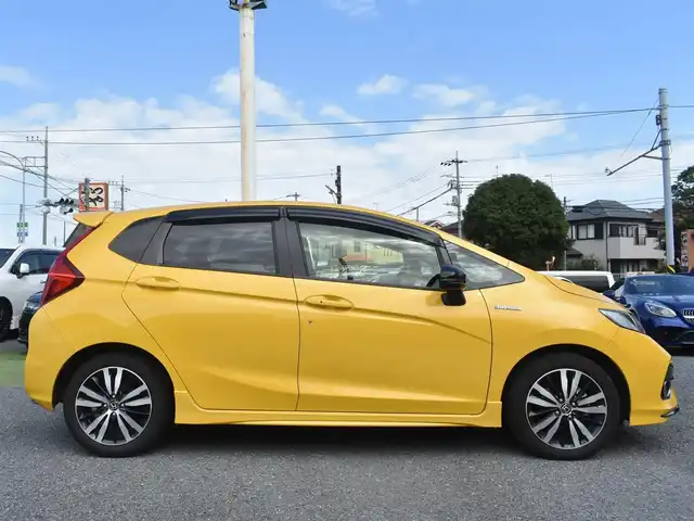 ホンダ フィット ハイブリット S ホンダセンシング 神奈川県 2019(令1)年 3.9万km プレミアムイエローパールⅡ ドラレコ/ホンダセンシング/純正メモリナビ/Bluetooth/バックカメラ/地デジTV/ETC/ドアバイザー/純正フロアマット/取説ナビ説/スペアスマートキー/記録簿（R7）