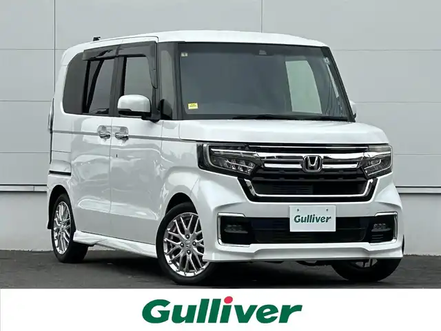 ホンダ Ｎ ＢＯＸ カスタム L ターボ 佐賀県 2021(令3)年 4.9万km プラチナホワイトパール ホンダセンシング/レーダークルーズコントロール/レーンキープアシスト/バックセンサー/社外ディスプレイオーディオ/・バックカメラ/・BT/CD/両側パワースライドドア/純正15インチAW/電動パーキングスイッチ/LEDヘッドライト/オートライト/フォグランプ/ドライブレコーダー(DRV-350)/プッシュスタート/ステアリングスイッチ/リアサンシェード/リアバックテーブル/電動格納ミラー/フロアマット/ドアバイザー/ISOFIX/エアバックW/サイド/カーテン