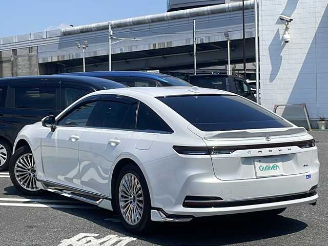 トヨタ クラウン Z 東京都 2024(令6)年 1.3万km プレシャスホワイトパール モデリスタエアロ/フルセグテレビ/全方位カメラ/ウィンカーミラー/クルーズコントロール/ドアバイザー/プッシュスタート/パワーバックドア/ETC2.0/LEDヘッドライト/レザーシート/全席パワーシート/全席シートヒーター/エアーシート/パドルシフト/置くだけ充電/デジタルインナーミラー /PCS/BSM/AC100Vコンセント/CタイプUSBポート