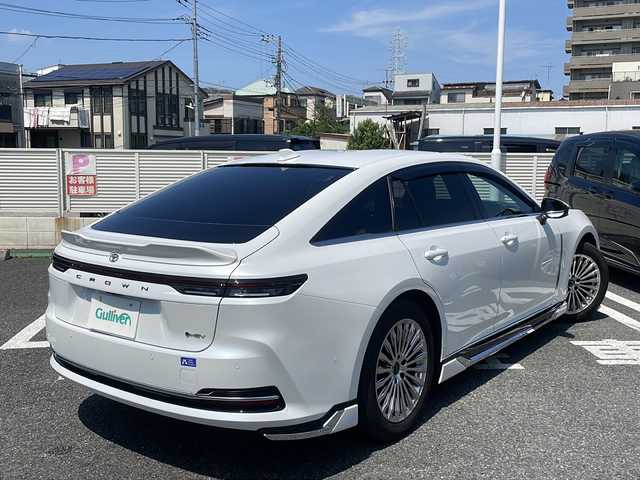 トヨタ クラウン Z 東京都 2024(令6)年 1.3万km プレシャスホワイトパール モデリスタエアロ/フルセグテレビ/全方位カメラ/ウィンカーミラー/クルーズコントロール/ドアバイザー/プッシュスタート/パワーバックドア/ETC2.0/LEDヘッドライト/レザーシート/全席パワーシート/全席シートヒーター/エアーシート/パドルシフト/置くだけ充電/デジタルインナーミラー /PCS/BSM/AC100Vコンセント/CタイプUSBポート