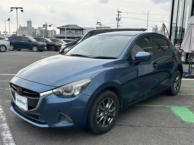マツダ デミオ 13Sテーラードブラウン 長崎県 2017(平29)年 7.4万km エターナルブルーマイカ 衝突軽減ブレーキ/ブラインドスポットモニター/純正ナビ/シートヒーター/バックカメラ/レーダークルーズコントロール/レーンキープアシスト/オートライト/LEDヘッドライト/シートヒーター/ステアリングスイッチ/コーナーセンサー/アイドリングストップ/スマートキー/スペアキー