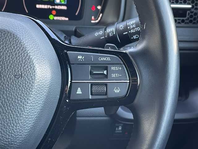 ホンダ ステップワゴン スパーダ eHEV 東京都 2023(令5)年 2万km パープルＭ 純正ナビ/電動パワーバックドア/全周囲カメラ/フルセグTV/前後ドライブレコーダー/両側電動スライドドア/ETC/オットマン/デジタルインナーミラー/パドルシフト/純正フロアマット/サイドバイザー/前席シートヒーター/前後コーナーセンサー/衝突軽減装置/横滑り防止装置/LEDライト/フォグライト