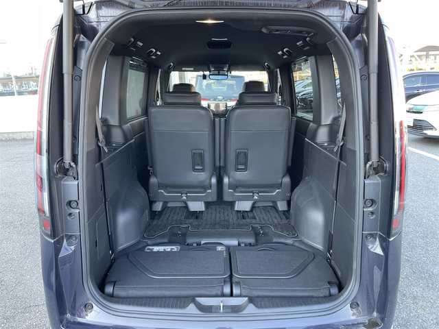 ホンダ ステップワゴン スパーダ eHEV 東京都 2023(令5)年 2万km パープルＭ 純正ナビ/電動パワーバックドア/全周囲カメラ/フルセグTV/前後ドライブレコーダー/両側電動スライドドア/ETC/オットマン/デジタルインナーミラー/パドルシフト/純正フロアマット/サイドバイザー/前席シートヒーター/前後コーナーセンサー/衝突軽減装置/横滑り防止装置/LEDライト/フォグライト