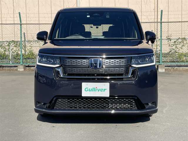 ホンダ ステップワゴン スパーダ eHEV 東京都 2023(令5)年 2万km パープルＭ 純正ナビ/電動パワーバックドア/全周囲カメラ/フルセグTV/前後ドライブレコーダー/両側電動スライドドア/ETC/オットマン/デジタルインナーミラー/パドルシフト/純正フロアマット/サイドバイザー/前席シートヒーター/前後コーナーセンサー/衝突軽減装置/横滑り防止装置/LEDライト/フォグライト