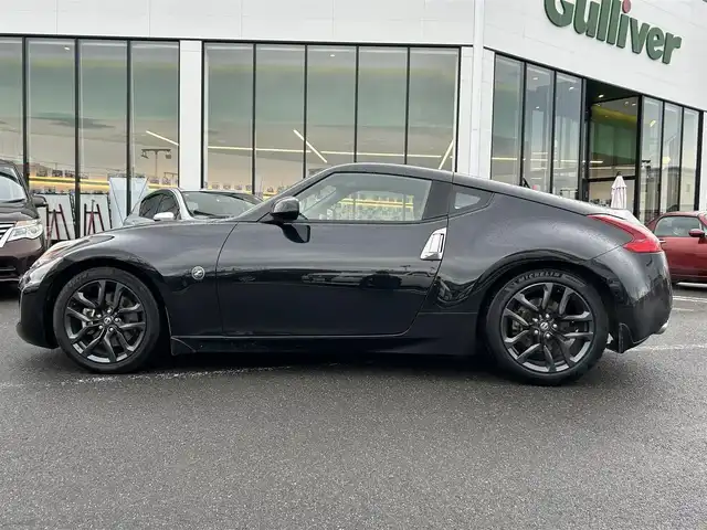 日産 フェアレディ Ｚ バージョンT 長崎県 2018(平30)年 5.7万km ダイヤモンドブラック 純正HDDナビ(BT/FM/AM/CD/ワンセグTV)/プッシュスタート/スマートキー/オートエアコン/バックカメラ/純正フロアマット/純正18インチアルミホイール/スエード調コンビシート/ABS/横滑り防止装置/オートライト/SRSダブル・サイドエアバッグ/SRSカーテンエアバッグ