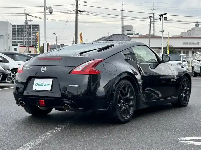 日産 フェアレディ Ｚ バージョンT 長崎県 2018(平30)年 5.7万km ダイヤモンドブラック 純正HDDナビ(BT/FM/AM/CD/ワンセグTV)/プッシュスタート/スマートキー/オートエアコン/バックカメラ/純正フロアマット/純正18インチアルミホイール/スエード調コンビシート/ABS/横滑り防止装置/オートライト/SRSダブル・サイドエアバッグ/SRSカーテンエアバッグ