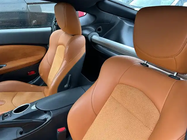 日産 フェアレディ Ｚ バージョンT 長崎県 2018(平30)年 5.7万km ダイヤモンドブラック 純正HDDナビ(BT/FM/AM/CD/ワンセグTV)/プッシュスタート/スマートキー/オートエアコン/バックカメラ/純正フロアマット/純正18インチアルミホイール/スエード調コンビシート/ABS/横滑り防止装置/オートライト/SRSダブル・サイドエアバッグ/SRSカーテンエアバッグ