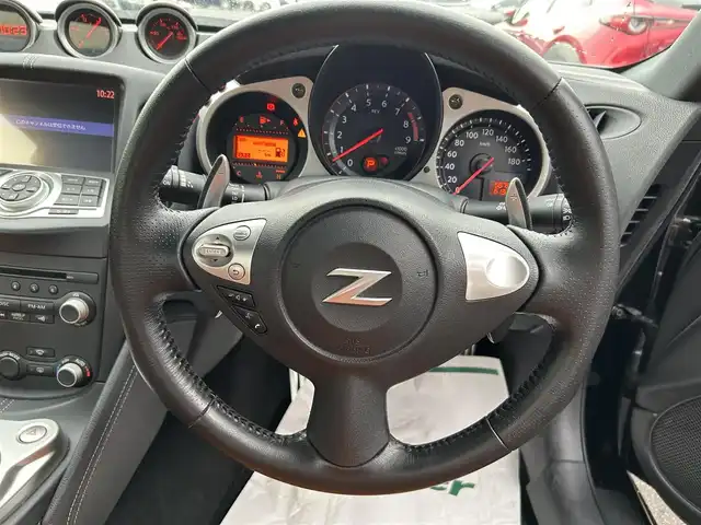 日産 フェアレディ Ｚ バージョンT 長崎県 2018(平30)年 5.7万km ダイヤモンドブラック 純正HDDナビ(BT/FM/AM/CD/ワンセグTV)/プッシュスタート/スマートキー/オートエアコン/バックカメラ/純正フロアマット/純正18インチアルミホイール/スエード調コンビシート/ABS/横滑り防止装置/オートライト/SRSダブル・サイドエアバッグ/SRSカーテンエアバッグ