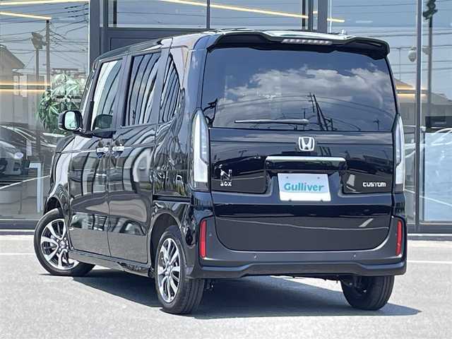 ホンダ Ｎ ＢＯＸ カスタム 茨城県 2023(令5)年 0.1万km未満 クリスタルブラックパール 純正ディスプレイオーディオ/【AM・FM・BT・USB・iPod・HDMI・AppleCarPlay・AndroidAuto】/レーダークルコン/Bカメラ/前後コーナーセンサー/シートヒーター/片側パワスラ/ブレーキホールド/オートライト/LEDライト/ヘッドライトレベライザー/純正アルミホイール/フロアマット/USB入力端子