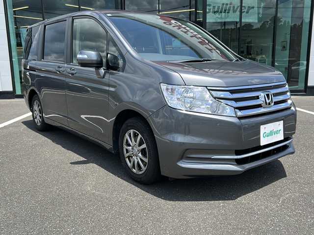ホンダ ステップワゴン G Eセレクション 鹿児島県 2013(平25)年 14.4万km ポリッシュドメタルメタリック 社外カロッツェリアSDナビ/バックカメラ/社外ドライブレコーダー/社外【TRG】15インチアルミホイール/両側パワースライドドア/ETC/ミュージックプレーヤーＡＵＸ接続可能/横滑り防止/ウィンカーミラー/チップアップシート
