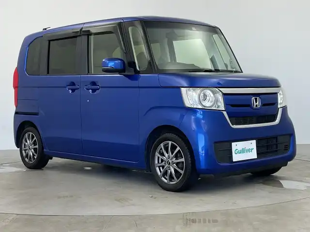 ホンダ Ｎ ＢＯＸ G L ホンダセンシング 鹿児島県 2018(平30)年 6万km ブリリアントスポーティブルーメタリック2トーン ホンダセンシング /・衝突軽減ブレーキ/・誤発進抑制機能/・歩行者事故低減ステアリング/・路外逸脱抑制機能/・アダプティブクルーズコントロール/・車線維持支援システム/・オートハイビーム/・先行車発進お知らせ機能/・標識認識機能/社外ナビ 【MDV-D504BT】/（フルセグ/Bluetooth)/バックカメラ/両側電動スライドドア/スマートキー/プッシュスタート/ビルトインETC/LEDヘッドライト/オートライト/カーテンエアバック