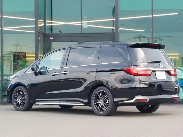ホンダ オデッセイ ハイブリッド e:HEVアブソルート EX 東京都 2025(令7)年 0.3万km 黒 Honda SENSING/・衝突軽減ブレーキ/・誤発進抑制機能/・車線維持支援システム/・先行車発進お知らせ機能/・アダプティブクルーズコントロール/・オートハイビーム/・ブラインドスポットインフォメーション/・マルチビューカメラシステム/プッシュスタート/パドルシフト/純正ナビ/フルセグTV/ETC/ワイヤレス充電器/両側パワースライドドア/レザーシート/パワーシート/オットマン/シートヒーター/ハンズフリーアクセスパワーテールゲート/LEDヘッドライト/18インチ純正アルミホイール
