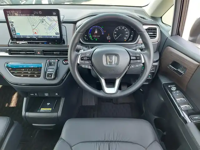 ホンダ オデッセイ ハイブリッド e:HEVアブソルート EX 東京都 2025(令7)年 0.3万km 黒 Honda SENSING/・衝突軽減ブレーキ/・誤発進抑制機能/・車線維持支援システム/・先行車発進お知らせ機能/・アダプティブクルーズコントロール/・オートハイビーム/・ブラインドスポットインフォメーション/・マルチビューカメラシステム/プッシュスタート/パドルシフト/純正ナビ/フルセグTV/ETC/ワイヤレス充電器/両側パワースライドドア/レザーシート/パワーシート/オットマン/シートヒーター/ハンズフリーアクセスパワーテールゲート/LEDヘッドライト/18インチ純正アルミホイール