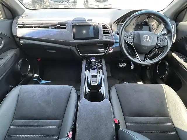 ホンダ ヴェゼル ハイブリッド RS ホンダセンシング 福岡県 2016(平28)年 2.2万km ホワイトオーキッドパール ・純正ナビ/（BLUETOOTH/フルセグ/バックカメラ/DVD再生/・ETC/・スペアキー/・シートヒーター/・プッシュスタート/・レーンキープアシスト/・カーテンエアバッグ/・ハーフレザーシート/・純正アルミホイール/・LEDライト/・オートライト/・電動格納ミラー/・保証書