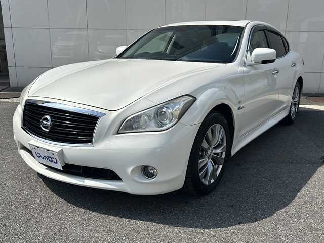 日産 フーガ ハイブリッド 埼玉県 2012(平24)年 8万km クリスタルホワイトパール (株)IDOMが運営する【じしゃロン熊谷店】の自社ローン専用車両になりますこちらは現金またはオートローンご利用時の価格です。自社ローンご希望の方は別途その旨お申付け下さい/純正ナビ　/フルセグTV/バックカメラ　/オートエアコン　/MTモード付シフト　/前席シートヒーター/エアーシート/ステアリングスイッチ　/クルーズコントロール　/プッシュスタート　/ビルトインETC　/レザーシート　/サンルーフ