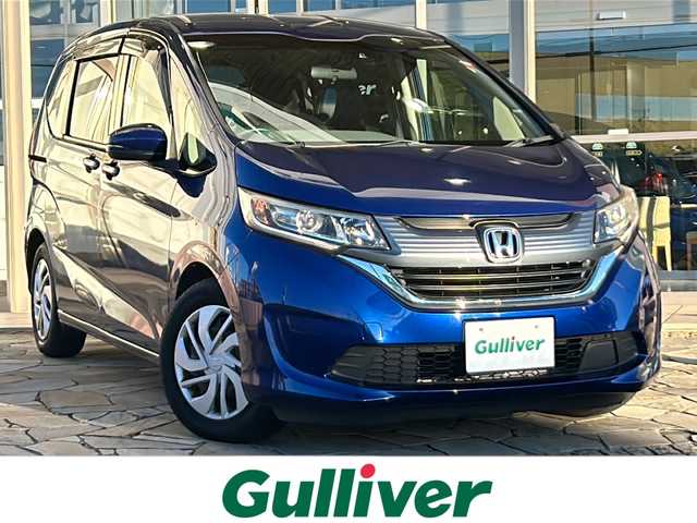 ホンダ フリード G ホンダセンシング 静岡県 2016(平28)年 5.2万km コバルトブルーパール 純正メモリナビ/・CD/・DVD/・フルセグＴＶ/・Bluetooth/・AM/・FM/主要装備/・両側パワスラ/・衝突軽減/・レーンキープ/・追従クルコン/・バックカメラ/・ETC/・LEDヘッドライト/・オートライト/・ステリモ/・スマートキー/・プッシュスタート/・純正フロアマット/・レザー調シートカバー