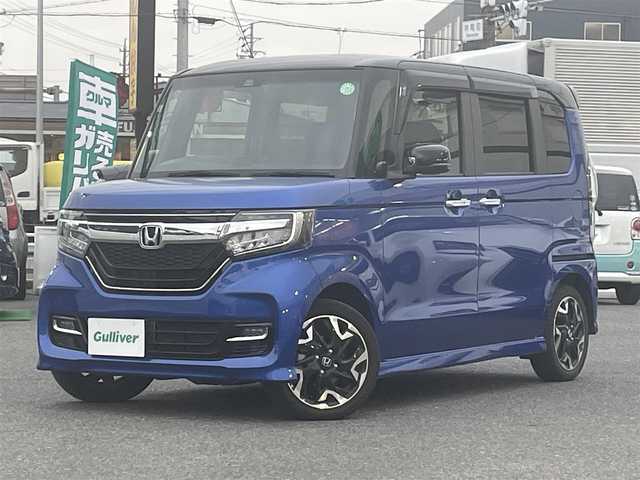 ホンダ Ｎ ＢＯＸ 2トン カスタム G L ホンダセンシング 愛知県 2020(令2)年 1.1万km ブリリアントスポーティブルーメタリック2トーン ワンオーナー/純正SDナビ/　AM/FM/CD/Bluetooth/バックカメラ/純正アルミホイール/純正フロアマット/純正ドアバイザー/衝突被害軽減システム/横滑り防止装置/レーンキープアシスト/レーダーブレーキサポート/追従機能付きクルーズコントロール/ETC/前後ドライブレコーダー/ステアリングスイッチ/パドルシフト/両側パワースライドドア/ハーフレザーシート/シートヒーター（前席）/スペアキー（1本）/保証書/取扱説明書