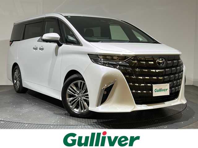 トヨタ アルファード Z 愛媛県 2024(令6)年 1.2万km プラチナホワイトパールマイカ ワンオーナー/純正14インチナビ/(Bluetooth/HDMI/フルセグ)/全周囲カメラ/レーダークルーズコントロール/デジタルインナーミラー/ワイヤレス充電/電動サイドサンシェード/ヘッドアップディスプレイ/オットマン/バックカメラウォッシャー/両側電動スライドドア/衝突被害軽減ブレーキ/前後コーナーセンサー/オートマチックハイビーム/オートライト/ガラスルーフ/パワーシート/ETC2.0/スペアキー/保証書/取扱説明書
