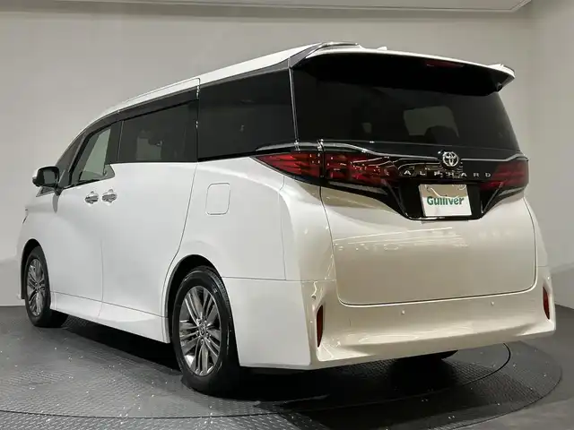 トヨタ アルファード Z 愛媛県 2024(令6)年 1.2万km プラチナホワイトパールマイカ ワンオーナー/純正14インチナビ/(Bluetooth/HDMI/フルセグ)/全周囲カメラ/レーダークルーズコントロール/デジタルインナーミラー/ワイヤレス充電/電動サイドサンシェード/ヘッドアップディスプレイ/オットマン/バックカメラウォッシャー/両側電動スライドドア/衝突被害軽減ブレーキ/前後コーナーセンサー/オートマチックハイビーム/オートライト/ガラスルーフ/パワーシート/ETC2.0/スペアキー/保証書/取扱説明書