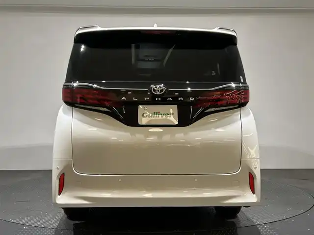 トヨタ アルファード Z 愛媛県 2024(令6)年 1.2万km プラチナホワイトパールマイカ ワンオーナー/純正14インチナビ/(Bluetooth/HDMI/フルセグ)/全周囲カメラ/レーダークルーズコントロール/デジタルインナーミラー/ワイヤレス充電/電動サイドサンシェード/ヘッドアップディスプレイ/オットマン/バックカメラウォッシャー/両側電動スライドドア/衝突被害軽減ブレーキ/前後コーナーセンサー/オートマチックハイビーム/オートライト/ガラスルーフ/パワーシート/ETC2.0/スペアキー/保証書/取扱説明書