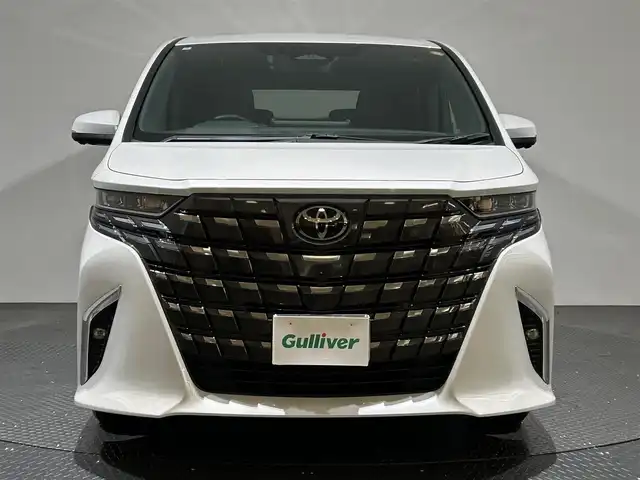 トヨタ アルファード Z 愛媛県 2024(令6)年 1.2万km プラチナホワイトパールマイカ ワンオーナー/純正14インチナビ/(Bluetooth/HDMI/フルセグ)/全周囲カメラ/レーダークルーズコントロール/デジタルインナーミラー/ワイヤレス充電/電動サイドサンシェード/ヘッドアップディスプレイ/オットマン/バックカメラウォッシャー/両側電動スライドドア/衝突被害軽減ブレーキ/前後コーナーセンサー/オートマチックハイビーム/オートライト/ガラスルーフ/パワーシート/ETC2.0/スペアキー/保証書/取扱説明書
